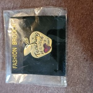 TEACHING IS A WORK OF HEART GOLD PIN W/ RED HEART STONE